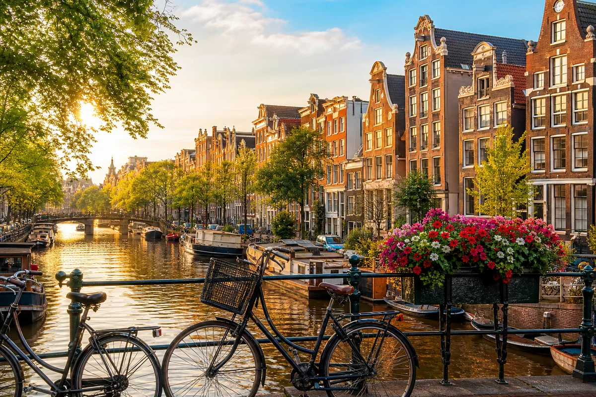 Amsterdam canal with gabled houses and bicycles